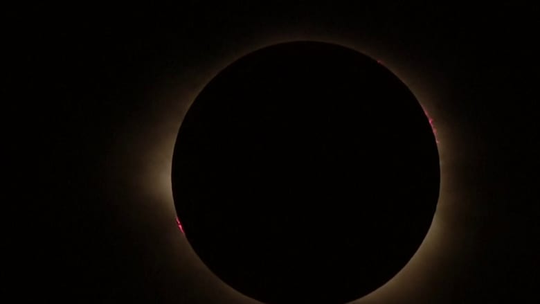Cloudy conditions obscure first glimpse of solar eclipse over Iceland