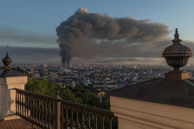 Smoke rises over the city after an air attack.