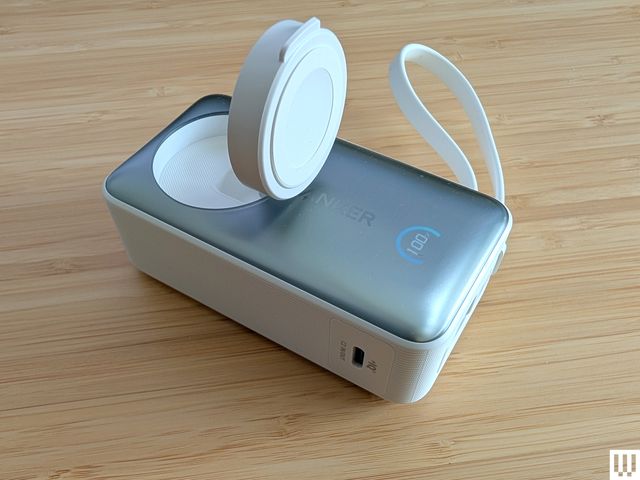 Anker MagGo Power Bank for Apple Watch, a white and silver rectangular device with a small strap on the side