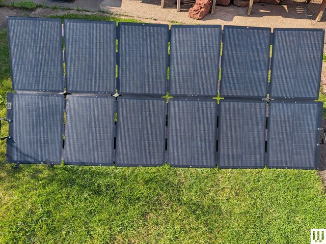Image may contain: Outdoors, Aerial View, Electrical Device, Gate, and Solar Panels