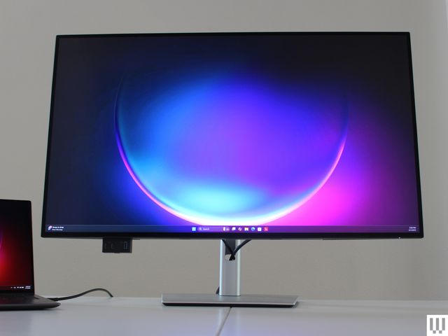 Front view of Dell UltraSharp 32 4K Thunderbolt Hub Monitor, a slender black screen with silver stand.
