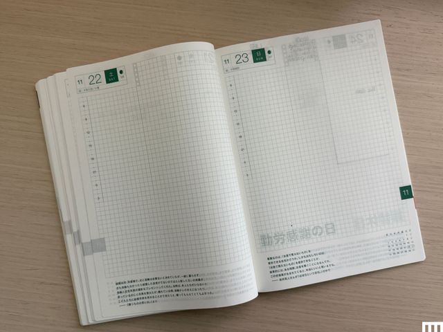 Planner laid open with blank gridlines