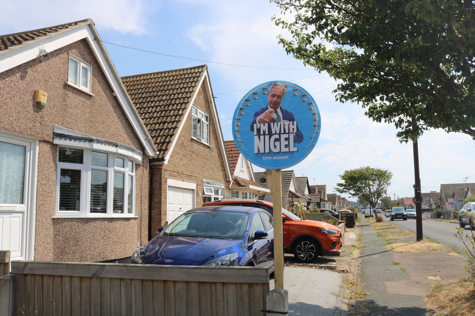 Image may contain Nigel Farage Neighborhood Architecture Building Outdoors Shelter City and License Plate