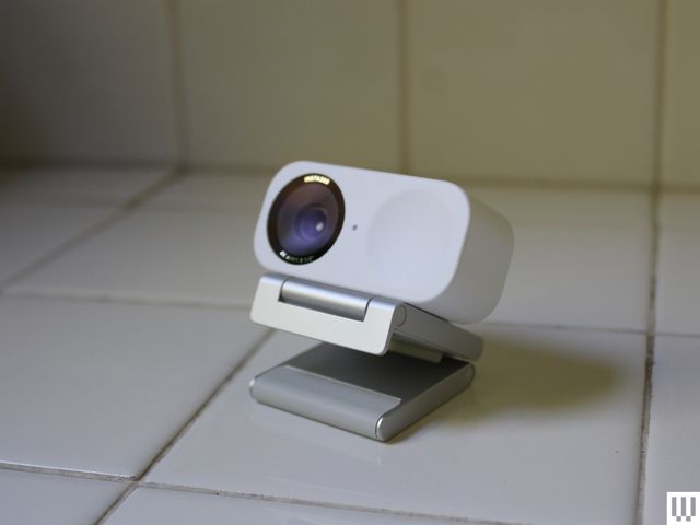 Small white rectangular webcam on white counter top