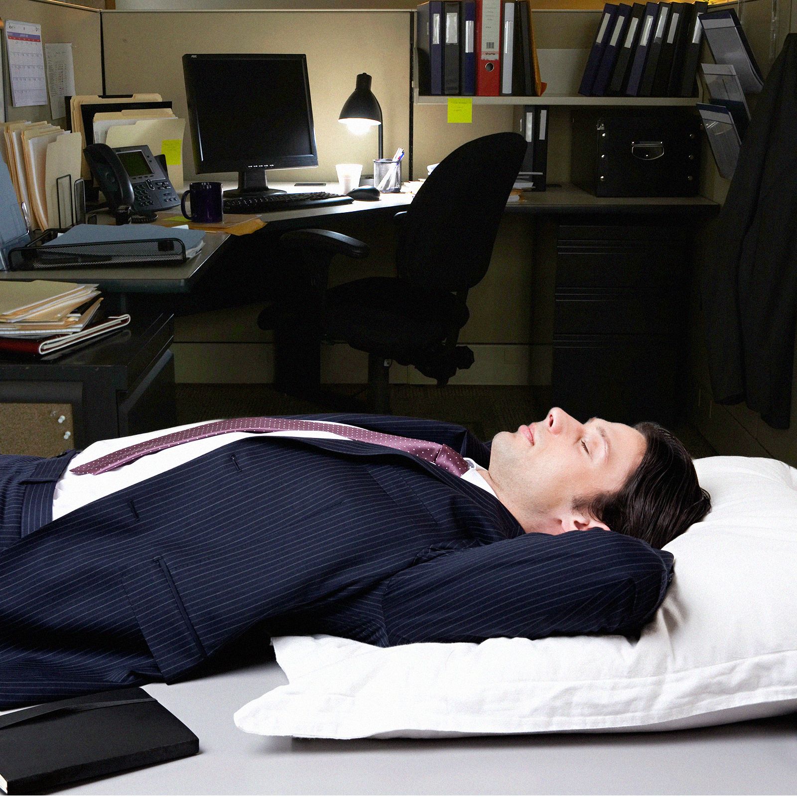 Image may contain Person Sleeping Chair Furniture Table Adult Desk Computer Hardware Electronics and Hardware