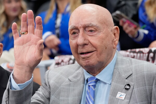 Dick Vitale arrives before an NCAA college basketball game between Duke and Texas, Nov. 4, 2025, in Charlotte, N.C. (AP Photo/Chris Carlson, File)