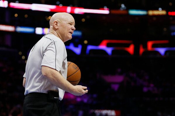 NBA official Joey Crawford is seen during an NBA basketball game between the Los Angeles Clippers and Milwaukee Bucks, Dec. 20, 2014, in Los Angeles. (AP Photo/Danny Moloshok, File)