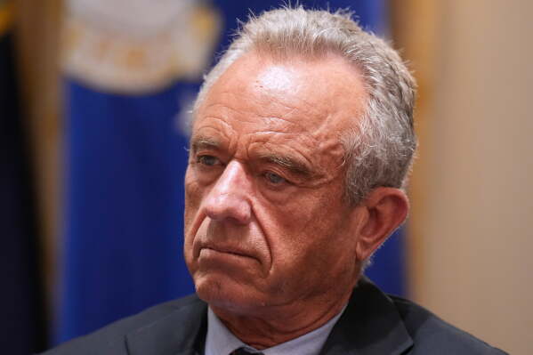 Secretary of Health and Human Services Robert F. Kennedy Jr., listens during a Cabinet meeting at the White House, May 27, 2026, in Washington. (AP Photo/Jacquelyn Martin, File)