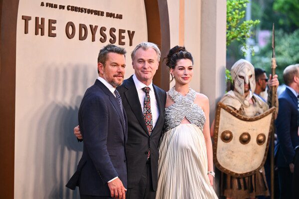 Matt Damon, from left, director Christopher Nolan, and Anne Hathaway attend the premiere of "The Odyssey" at AMC Lincoln Square on Tuesday, July 14, 2026, in New York. (Photo by Evan Agostini/Invision/AP)