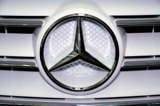 A Mercedes Benz logo is displayed on a vehicle at the Pittsburgh International Auto Show in Pittsburgh, Feb. 14, 2025. (AP Photo/Gene J. Puskar, File)